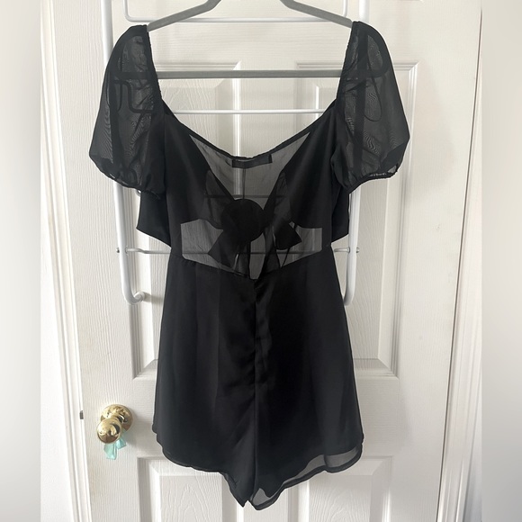 White Fox black one piece with tie at the front and built in shorts - Picture 2 of 3